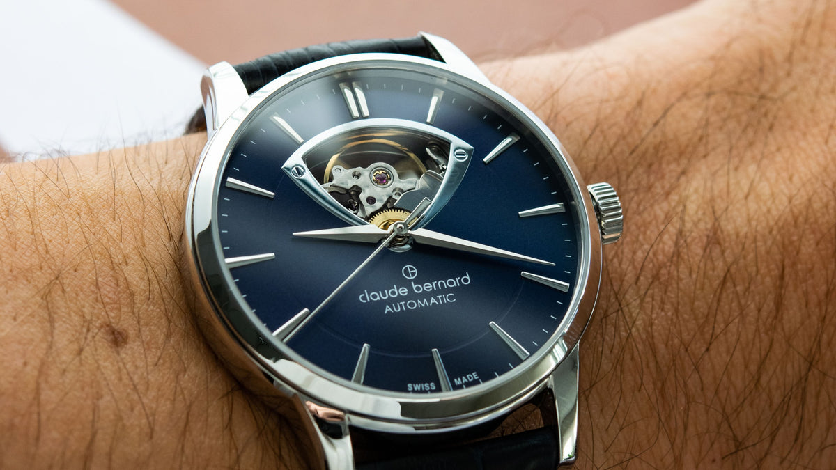 Claude Bernard Heritage automatic with an open-heart dial, worn on the wrist