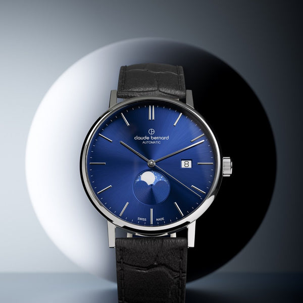 A slim moonphase on a leather strap